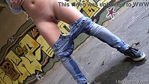 violeta stands proud by her outdoor puddle in public