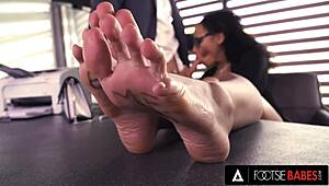 ebony romy indy wraps pretty feet around co-worker cock till cumshot