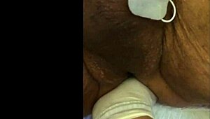 guy tries fisting with electrodi gadget close up