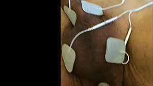 guy tries fisting with electrodi gadget close up