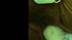 guy tries fisting with electrodi gadget close up