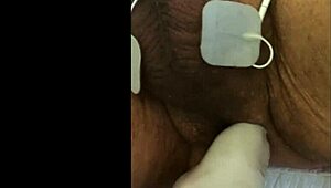 guy tries fisting with electrodi gadget close up