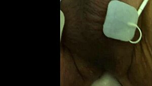 guy tries fisting with electrodi gadget close up