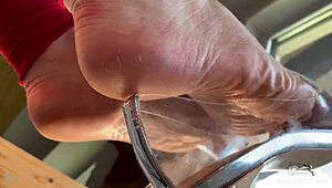 hey check my bare wrinkled feet dangling see-through high heels super close foot tease