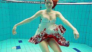 hot polish teen marketa teases small tits underwater at beach pool