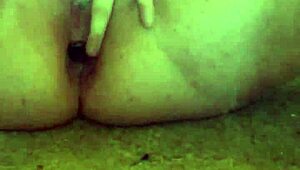 Shoving anal plug deep while g-spot vibrator makes her squirt