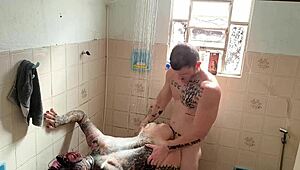 Tattooed Big Ass Clit Slut Fucked Bareback in Shower.