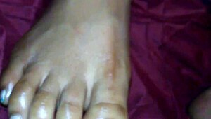 EBONY FEET WRAPPED AROUND COCK FOR MESSY CUMSHOT!