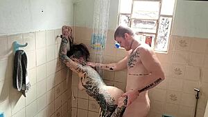 Tattooed Big Ass Clit Slut Fucked Bareback in Shower.
