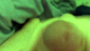 Stroking huge cock while eyeing amateur porn clips