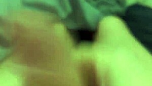 Stroking huge cock while eyeing amateur porn clips