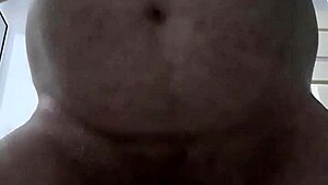 RustyAs1's Mature Belly Shakes in Homemade Piss and Solo Cock Play