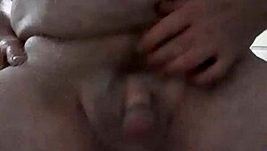 RustyAs1's Mature Belly Shakes in Homemade Piss and Solo Cock Play