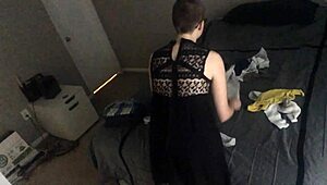Bald girl folds laundry nude ignoring voyeur on webcam