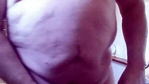 chris soaps up her natural tits and pussy in the steamy shower