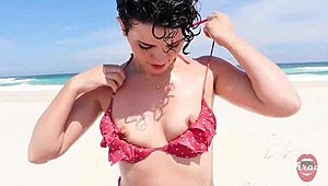 safada gives deepthroat blowjob on beach with skinny brunette in front of bathers