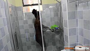 Skinny ebony lesbians shower together munching black pussy in bathroom