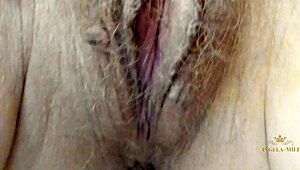 Angela milf rubs hairy pussy waiting young husband cock