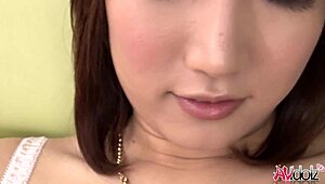 mikuni maisaki teases wet pussy on sofa with buzzing toy to orgasm