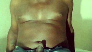 masturbating on new white bed spreading ass in jeans