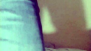 masturbating on new white bed spreading ass in jeans