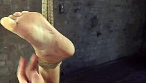 hogtied slave gagged choked caned with dildos in dungeon torment
