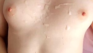 My stepsister strokes my cock with a handjob till huge cumshot blasts her tits in POV