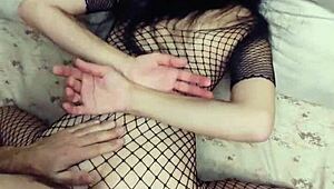 Real couple practices kissing and touching in stockings for upcoming casting interview.