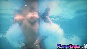 bombastic ebony julie kay strips naked poolside big tits posing