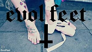 blonde ballerina in heels chokes on cock while licking toes barefoot on street?