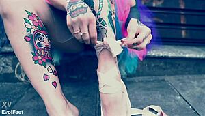 blonde ballerina in heels chokes on cock while licking toes barefoot on street?