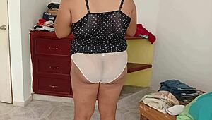 chubby girl tidies room and folds clothes voyeur style