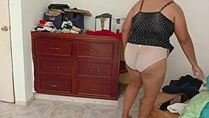 chubby girl tidies room and folds clothes voyeur style
