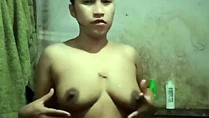 indonesian housewife strips naked in shower showing big tits pussy