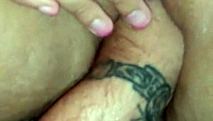 he fists the whore's stretched hole until she squirts in ecstasy