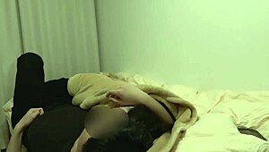 japanese amateur couple cuddles at home before sex