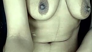 Real homemade first-time curvy milf leaks milk from big natural tits while moaning loud on camera.