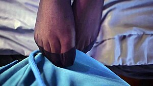 Metal chick kicks off long boots footjobs me in long socks interracial hairy pussy.