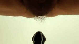 latexi69 teases tight ass with buttplug in shiny latex close up