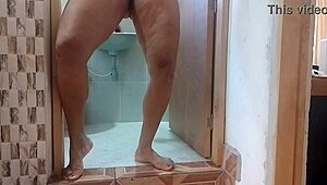 Milf Colombiana cachonda masturbates wildly with dildo at neighbor's bathroom door