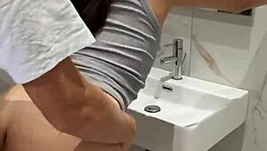 Quick bathroom fuck at the party while friends dance outside. Bent over creampie action heats up fast.