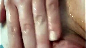 ruiva's big ass and clit shine in sensual shower tease with natural tits