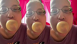 she pops those bubblegum bubbles super close for asmr headphone vibes