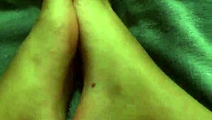 she rubs her high heel feet sensually