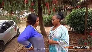 whoa these african milf lesbians are making out hot in public at the house party!