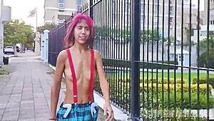 skinny latina flashes her small tits and hairy pussy under suspenders microskirt while topless on the street