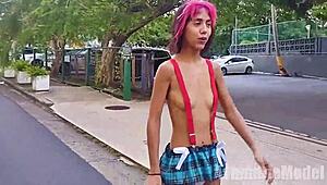 skinny latina flashes her small tits and hairy pussy under suspenders microskirt while topless on the street