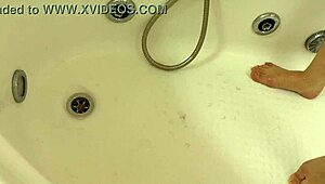 step into the shower as i carefully shave my wet hairy pussy smooth