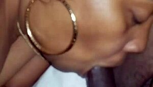 Black Milf Devours Monster Cock and Balls in Horny Blowjob