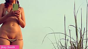 jeny smith lifts miniskirt on public beach, teases juicy pussy and bubble butt upskirt